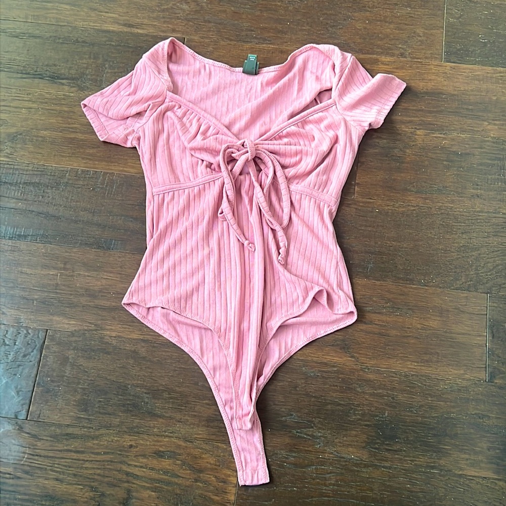 Pink bodysuit with a tie up from Wild Fable in size small